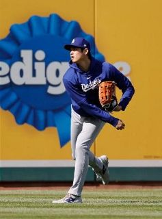 大谷、最長の２０メートルで投球　右肘手術からのリハビリ